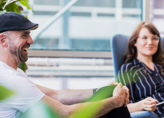 Stellar Elements Team talking in a lounge area